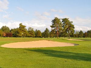 green surrounded by bunkers